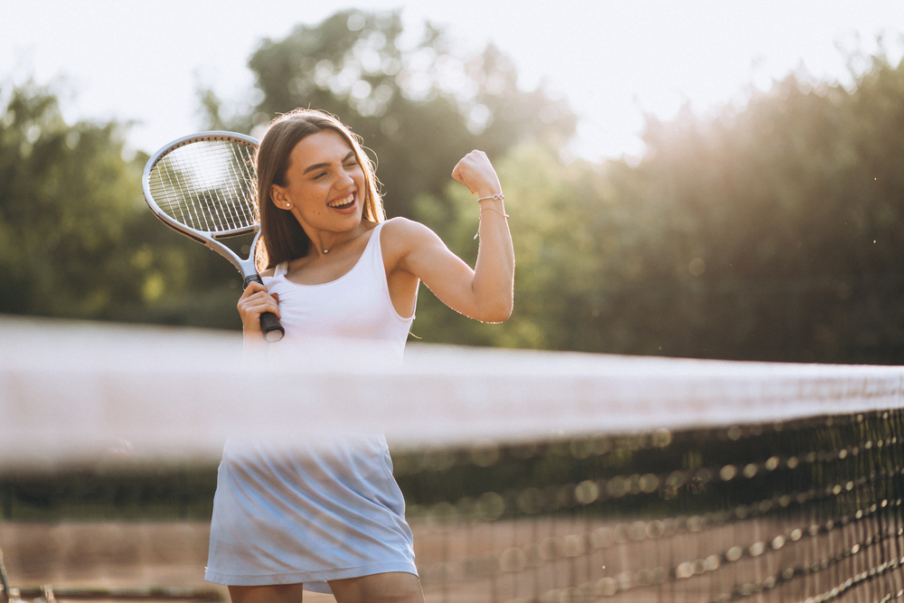 Woman playing tennis.